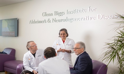 Biggs Institute showing faculty and patients seated discussing options medically
