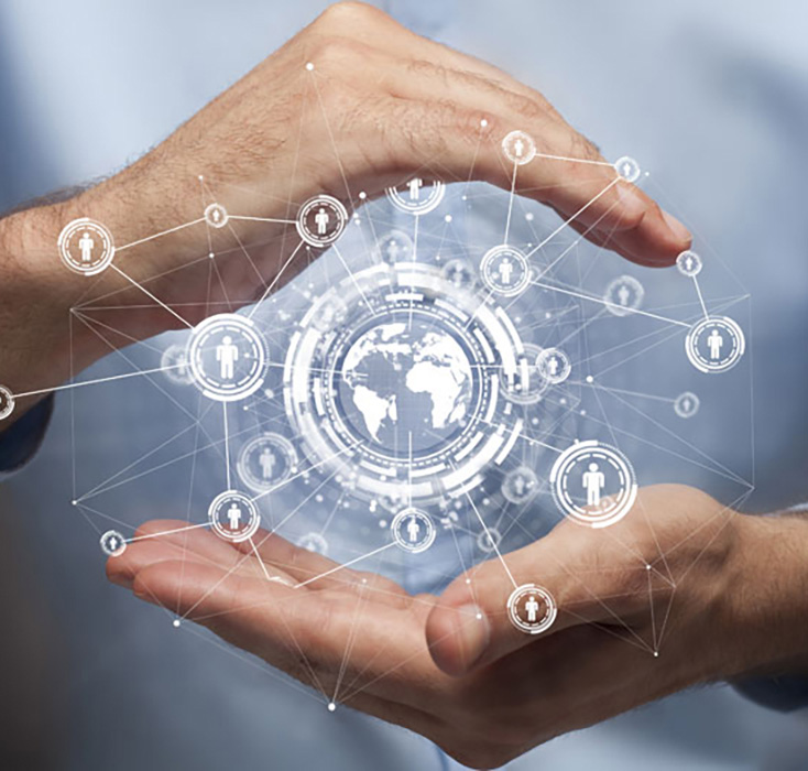 hands cupping model of earth with network of people