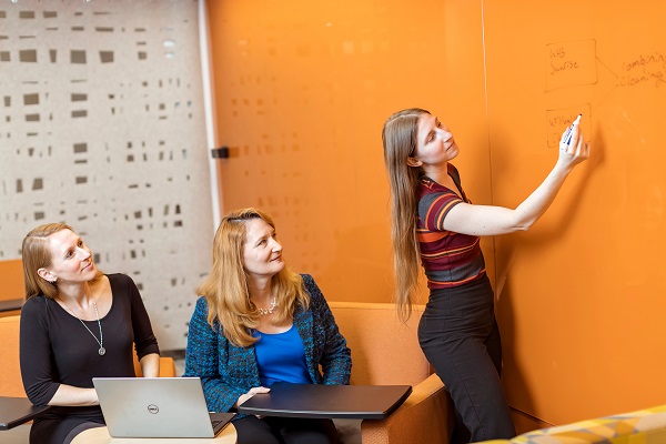 Paula Shireman, M.D. meets regularly with CIRD team members Laura Manuel (standing) and Oliva Ellsmore