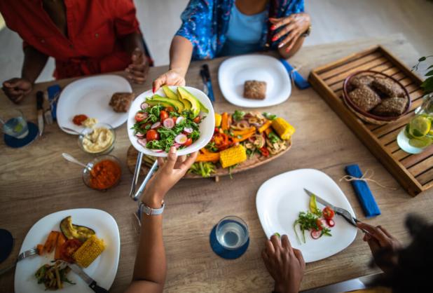 people at table of healthy food